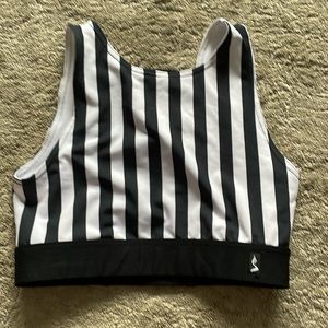 Sway reversable pole top